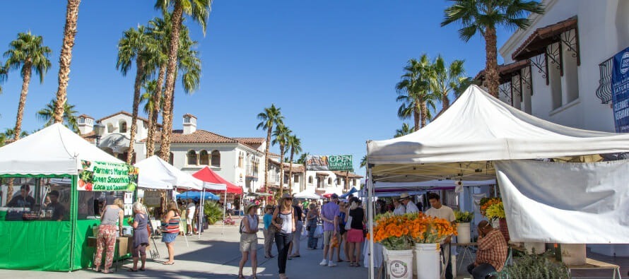 One of the best things to do in La Quinta, visitors go shopping around stalls in the Certified Farmers Market.